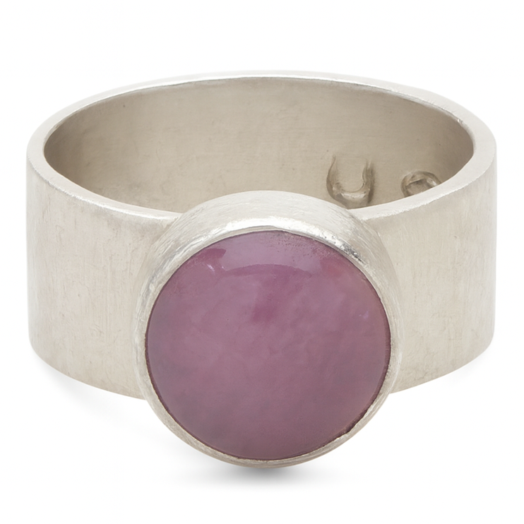 Silver ring with a purple kunzite stone on a white background